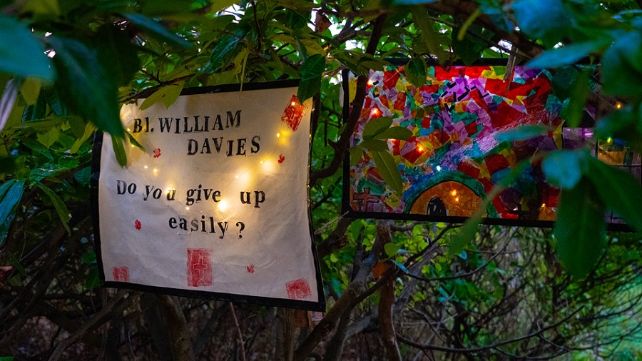 2 large pieces of artwork in the trees