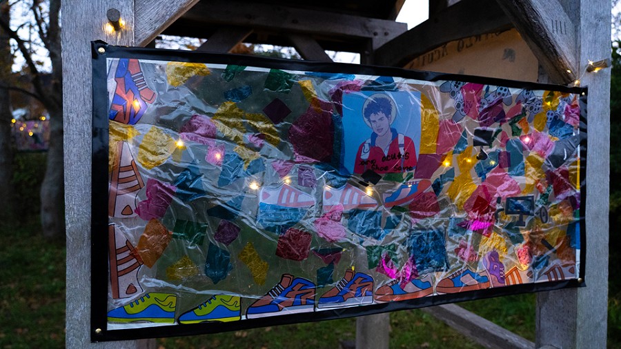 artwork made of plastic hung up outside